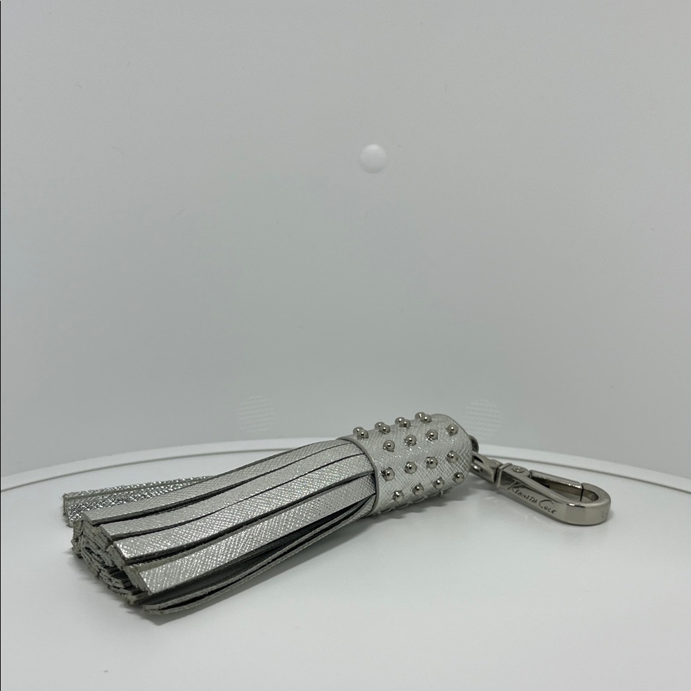 Kenneth Cole silver leather studded tassel bag charm or key fob